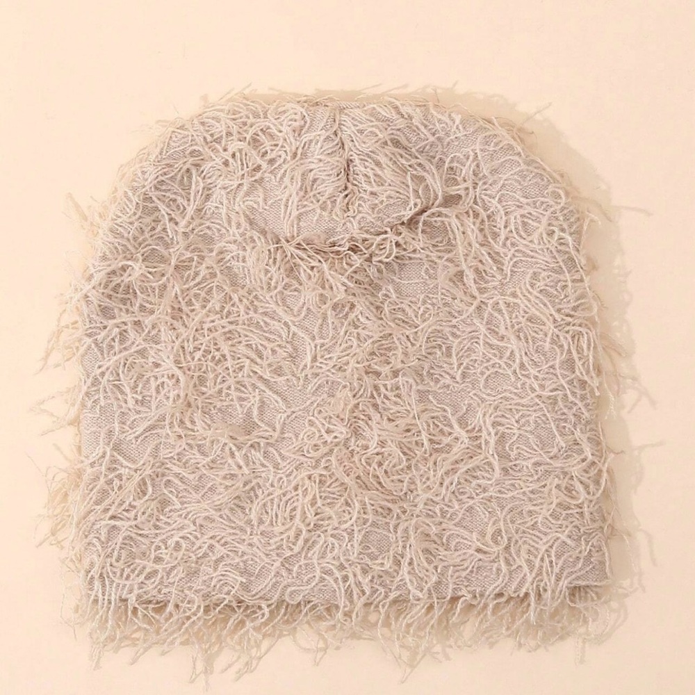 Beanie with tan strings